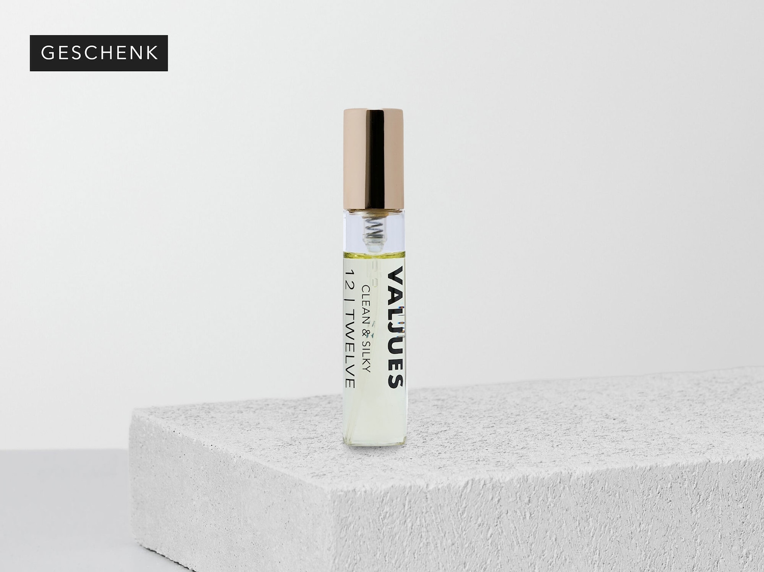 VALUUES Clean & Silky 12 I TWELVE fragrance in a clear glass bottle with a gold cap, presented as a 'GESCHENK' (gift).