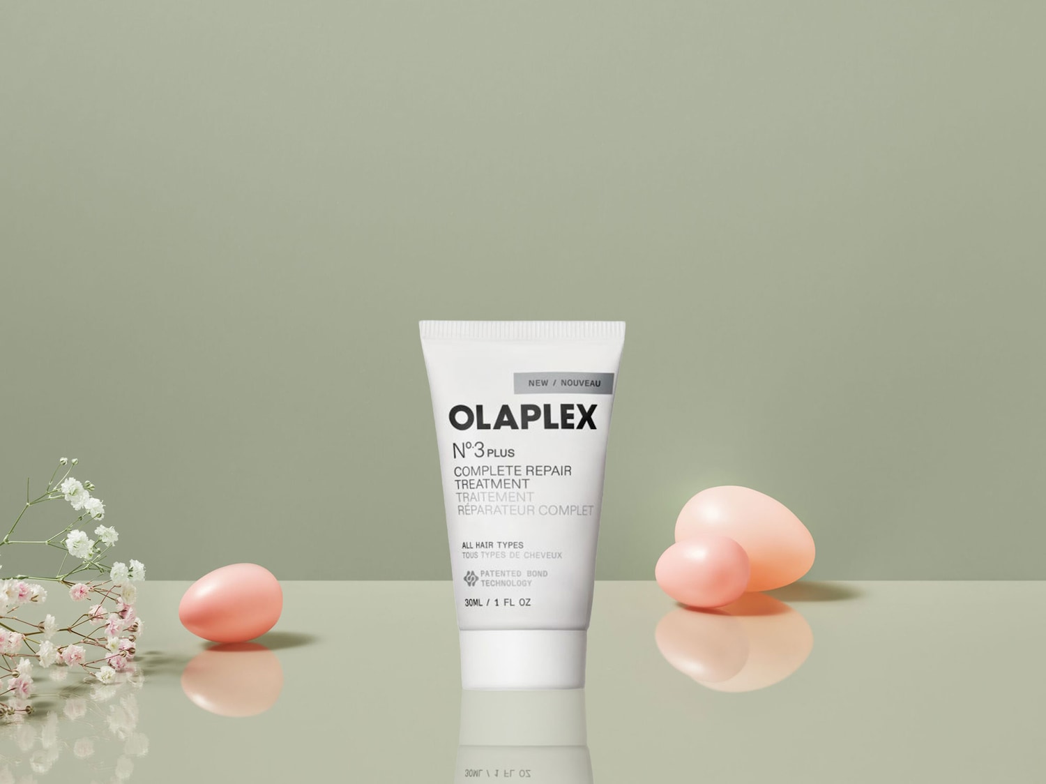 Olaplex N°3 Plus Complete Repair Treatment in a white tube, designed for all hair types, with patented bond technology, available in a 30ml/1 fl oz size.