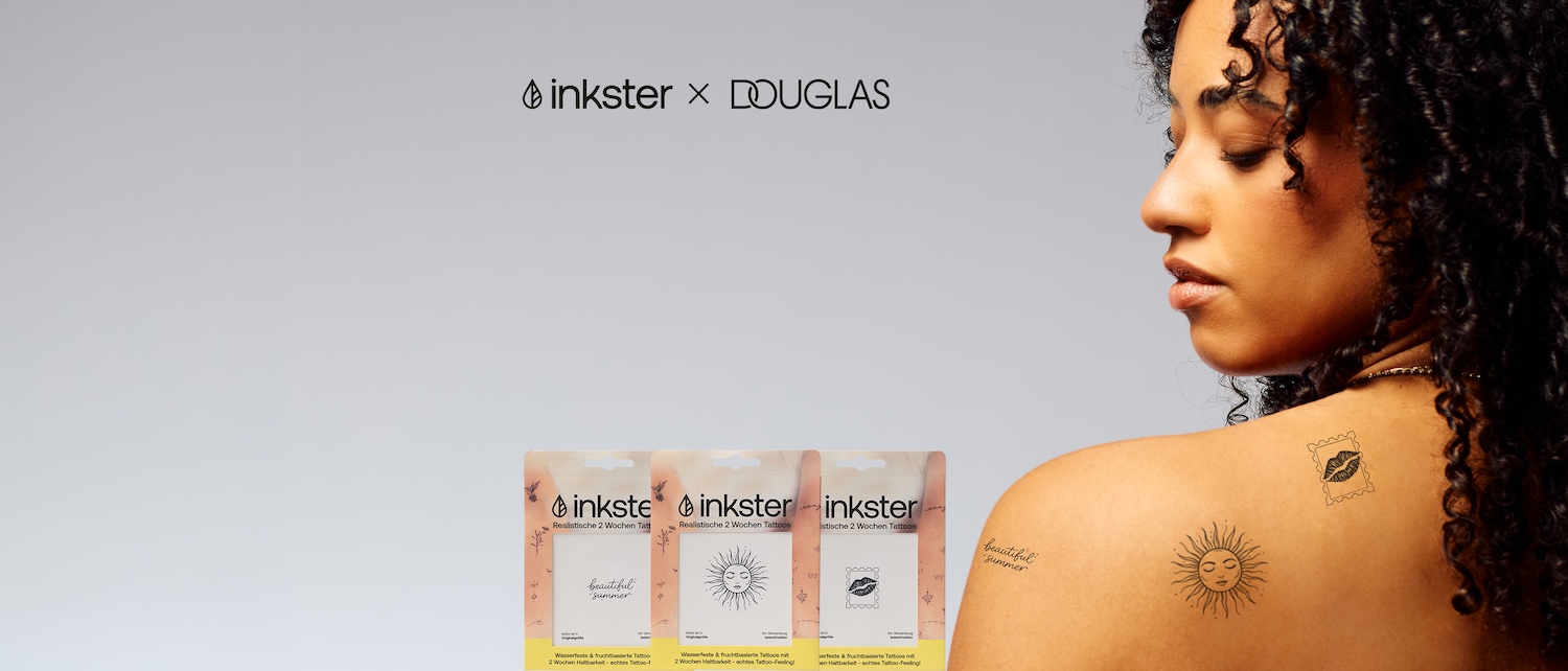 Inkster präsentiert in Kooperation mit Douglas realistische 2-Wochen-Tattoos mit sommerlichen Motiven wie Sonne und Lippen, die auf der Haut einer Frau zur Schau gestellt werden.