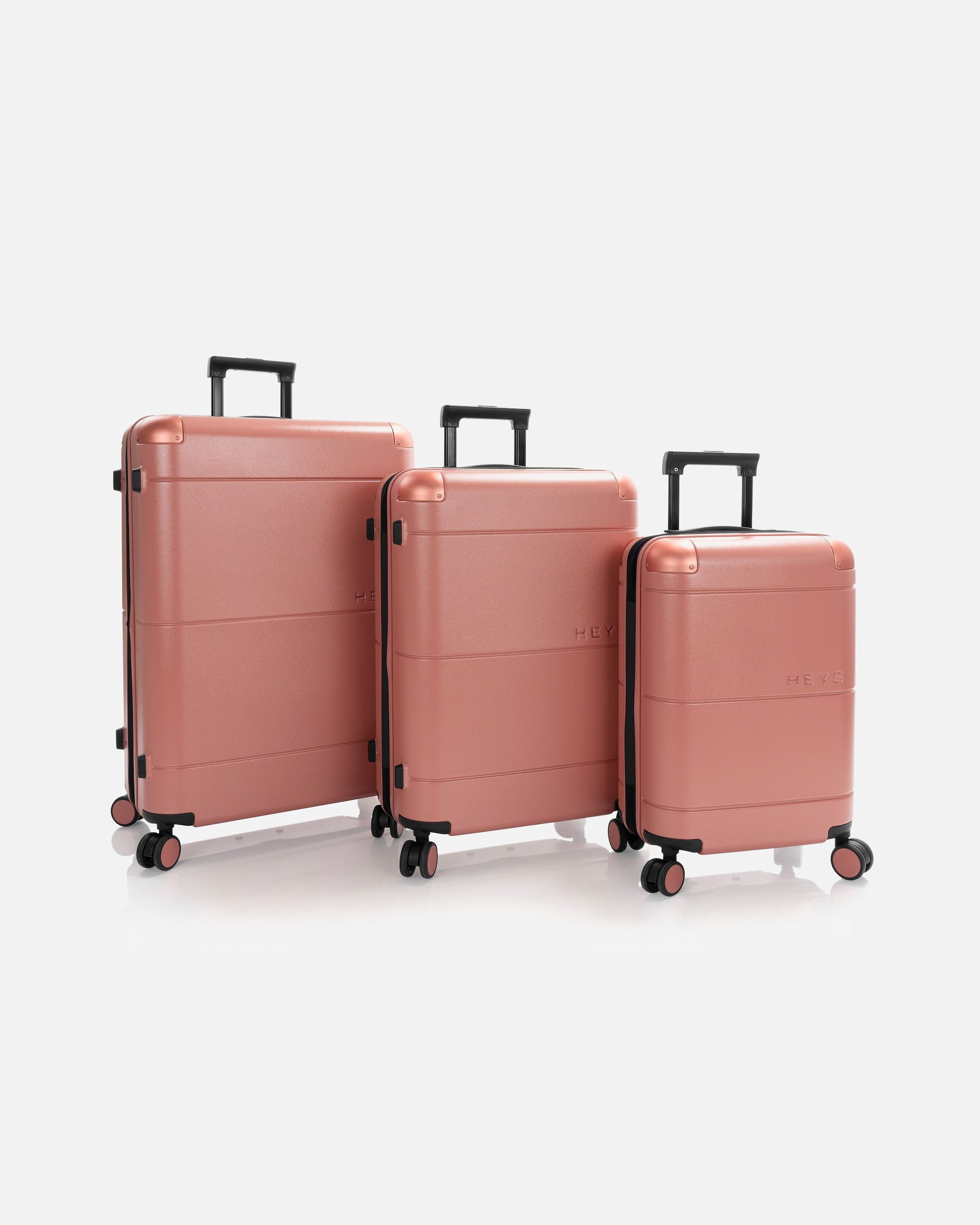 Koffer für Männlich Heys Zen 4 Rollen Kofferset 3-teilig mit Dehnfalte coral