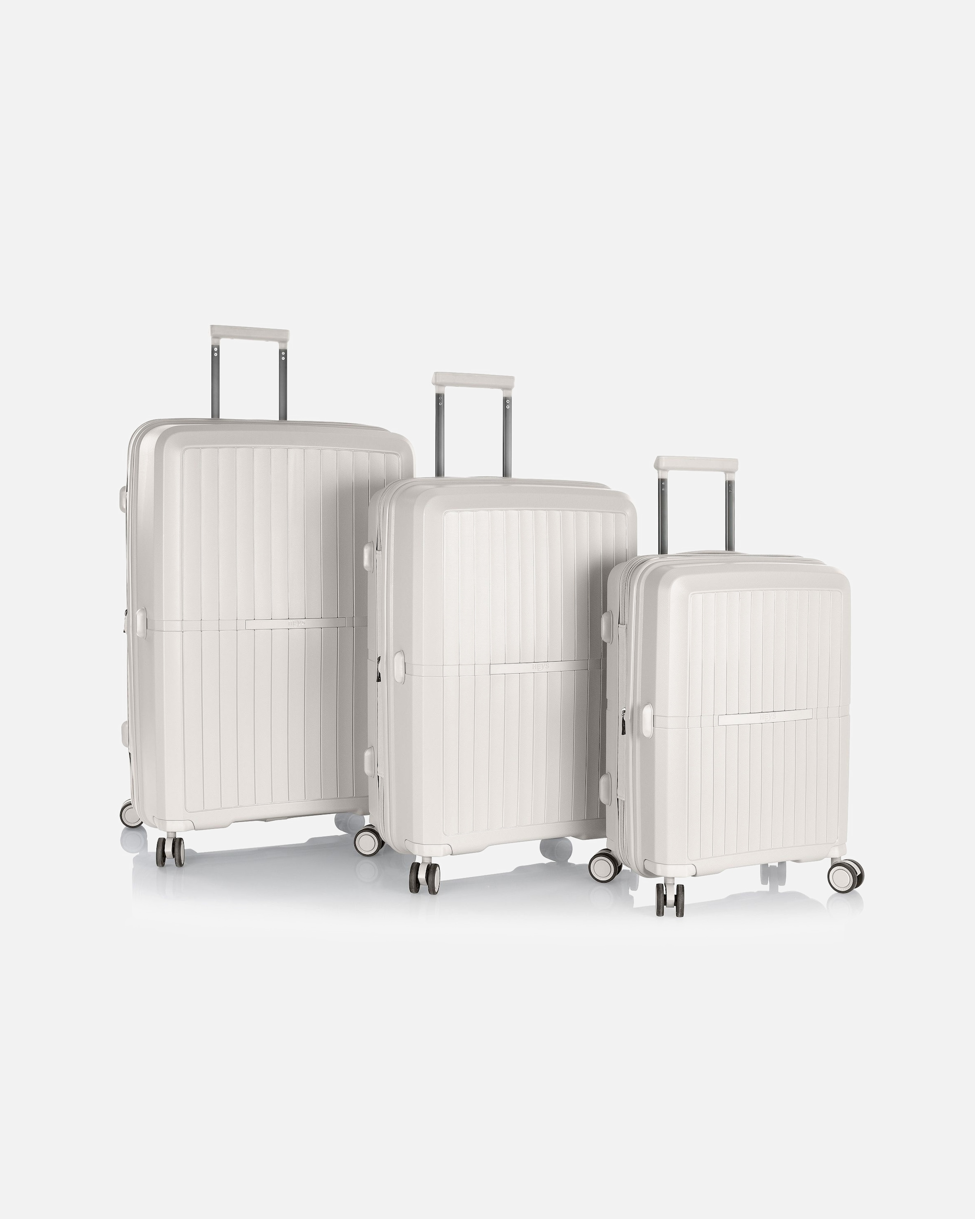 Koffer für Männlich Heys AirLite 4 Rollen Kofferset 3-teilig mit Dehnfalte white