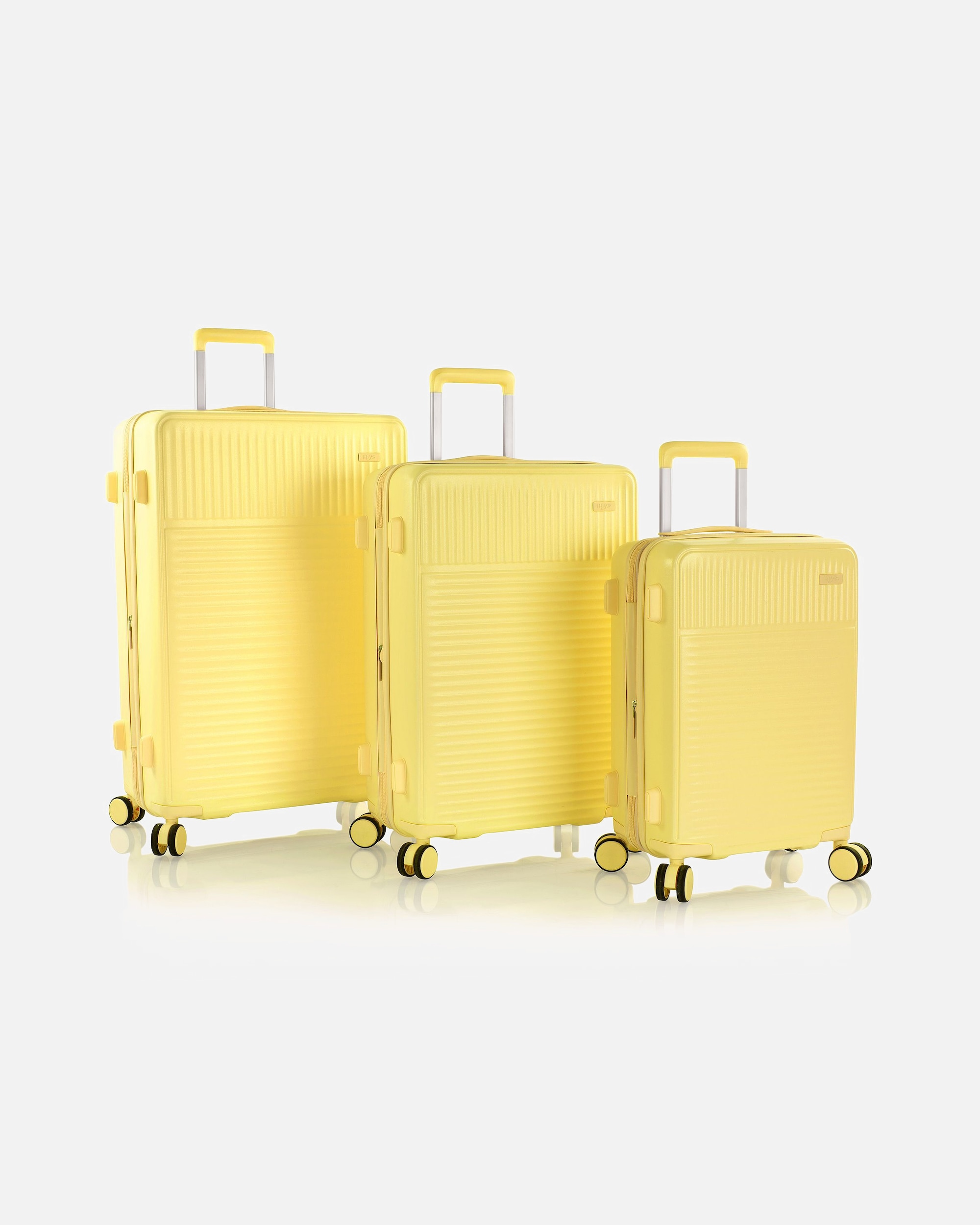 Koffer für Männlich Heys Pastel 4 Rollen Kofferset 3-teilig mit Dehnfalte yellow